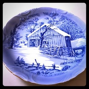 Two vintage decorative plates.